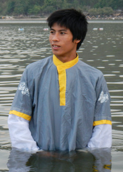 beach anorak grey swimming in lake