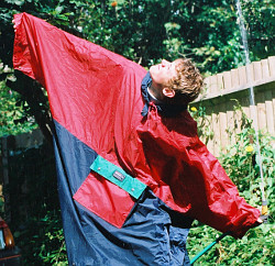 poncho blue red garden hose pipe